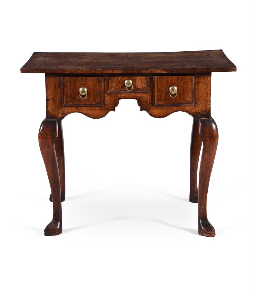 A GEORGE I WALNUT AND CROSSBANDED SIDE TABLE, CIRCA 1725