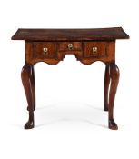 A GEORGE I WALNUT AND CROSSBANDED SIDE TABLE, CIRCA 1725