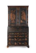 A GEORGE II BLACK LACQUER AND GILT JAPANNED BUREAU CABINET, CIRCA 1740