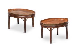 A PAIR OF GEORGE III MAHOGANY AND BRASS BOUND TRAYS ON LATER STANDS, THE TRAYS CIRCA 1780