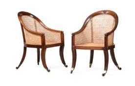 A PAIR OF REGENCY MAHOGANY LIBRARY BERGERE 'CURRICLE' ARMCHAIRS, ATTRIBUTED TO GILLOWS