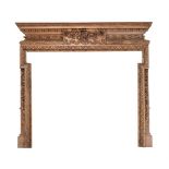 A GEORGE II CARVED PINE FIRE SURROUND, CIRCA 1740