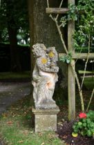 TWO SIMILAR STONE COMPOSITION FIGURES OF CHERUBS ON PLINTHS, 20TH CENTURY