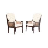 A PAIR OF MAHOGANY BERGERE ARMCHAIRS, IN REGENCY STYLE, AFTER DESIGNS BY GILLOWS, 20TH CENTURY