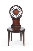 A GEORGE III MAHOGANY HALL CHAIR, IN THE MANNER OF THOMAS CHIPPENDALE, CIRCA 1770