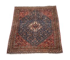 AN ANTIQUE QASHQAI RUG, LATE 19TH OR EARLY 20TH CENTURY, approximately 186 x 133cm