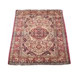AN ANTIQUE ISFAHAN RUG, CIRCA 1910, approximately 205 x 134cm