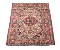 AN ANTIQUE ISFAHAN RUG, CIRCA 1910, approximately 205 x 134cm