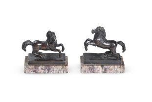 AFTER FRANCESCO FANELLI, A PAIR OF BRONZE PRANCING HORSES