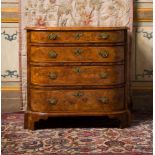 A GEORGE II BURR AND FIGURED WALNUT CHEST OF DRAWERS, CIRCA 1740