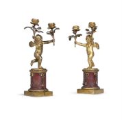 A PAIR OF GILT METAL CHERUB TWIN BRANCH CANDLESTICKS, FRENCH, MID TO LATE 19TH CENTURY
