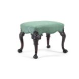 A GEORGE II CARVED MAHOGANY AND UPHOLSTERED STOOL, MID 18TH CENTURY