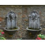 A PAIR OF MOULDED LEAD WALL FOUNTAINS, IN GEORGE III STYLE, 20TH CENTURY