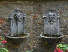 A PAIR OF MOULDED LEAD WALL FOUNTAINS, IN GEORGE III STYLE, 20TH CENTURY