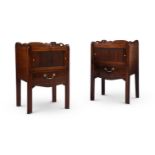 A CLOSELY MATCHED PAIR OF GEORGE III MAHOGANY BEDSIDE CUPBOARDS, CIRCA 1780
