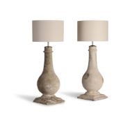A PAIR OF STONE COMPOSITION BALUSTER TABLE LAMPS