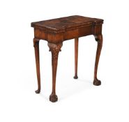 A GEORGE II WALNUT AND CROSSBANDED CONCERTINA ACTION CARD TABLE, MID 18TH CENTURY