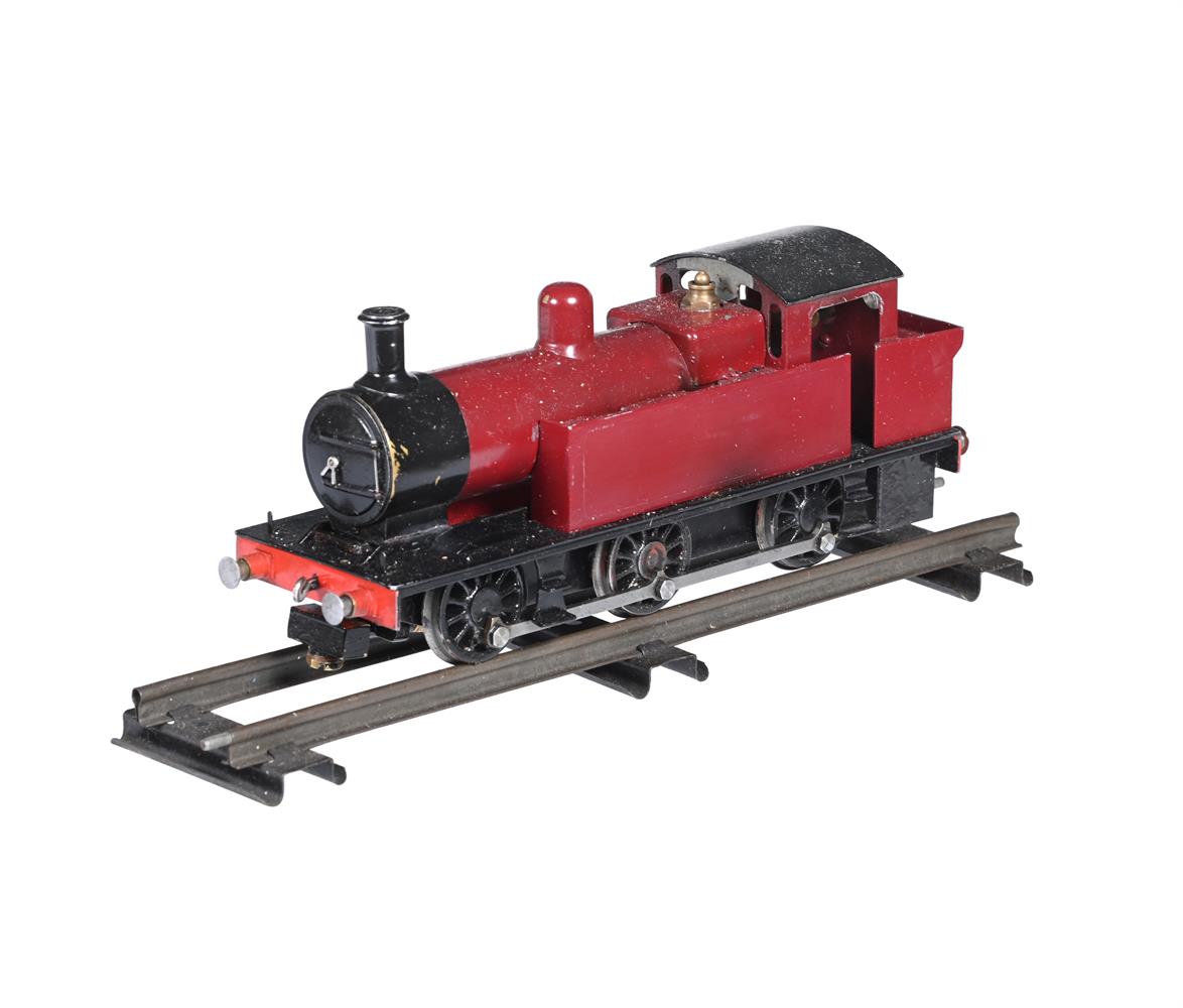 A HAND BUILT 00 GAUGE MODEL OF A LIVE STEAM 0-6-0 SIDE TANK LOCOMOTIVE