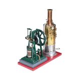 AN EXHIBITION STANDARD MODEL OF A VERTICAL LIVE STEAM STATIONARY ENGINE