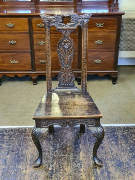 Carved oak Queen Ann legged hall chair