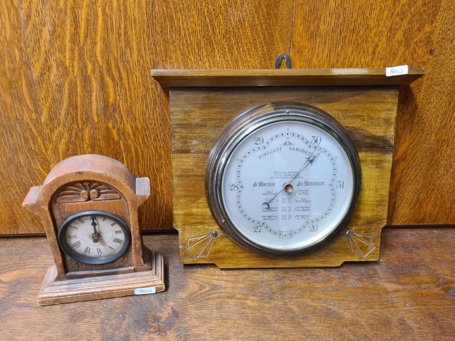 The Wilson Forcast barometer mounted on a walnut backing, British made, reg. no. 710284 and a