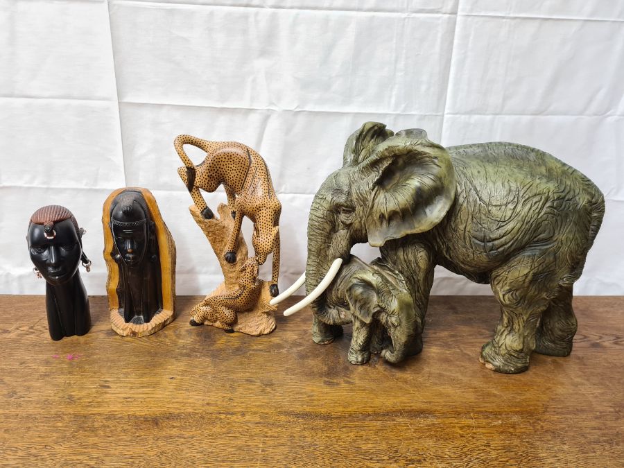 Large elephant and Caleb, 36cm tall, carved African heads and leopards