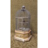 A singing bird cage automaton