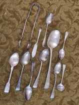 198g Georgian and later silver spoons and sugar nips