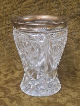 Silver rimmed cut glass vase