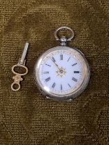 An engraved .935 silver ladies pocket watch