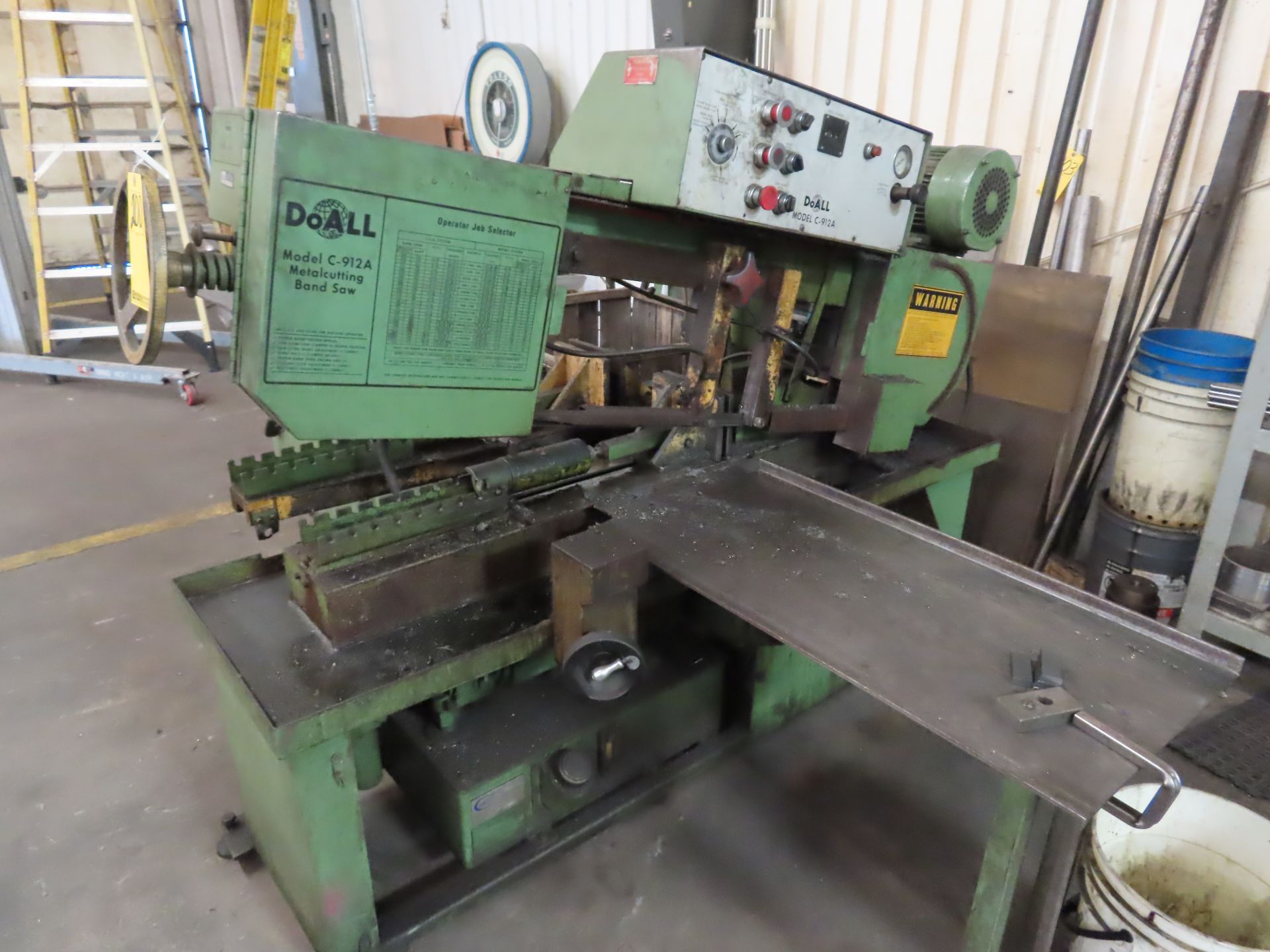 DOALL HORIZ. BANDSAW, M# C-912A, S/N 368-82550, 9" X 12" CAP., POWER CLAMP & FEED W/10' INFEED ROLLE