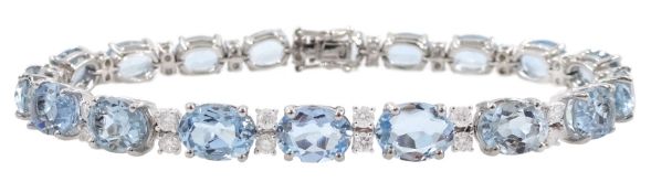 18ct white gold oval aquamarine and round brilliant cut diamond bracelet