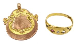 9ct rose gold fob medallion and an 18ct gold stone set ring