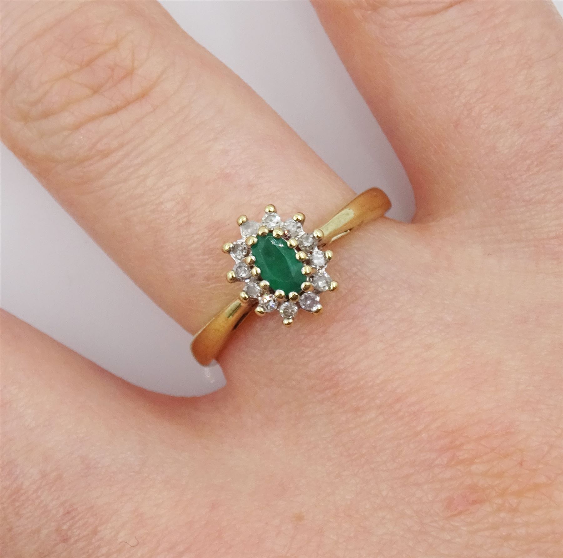 9ct gold oval emerald and round brilliant cut diamond cluster ring - Image 2 of 4