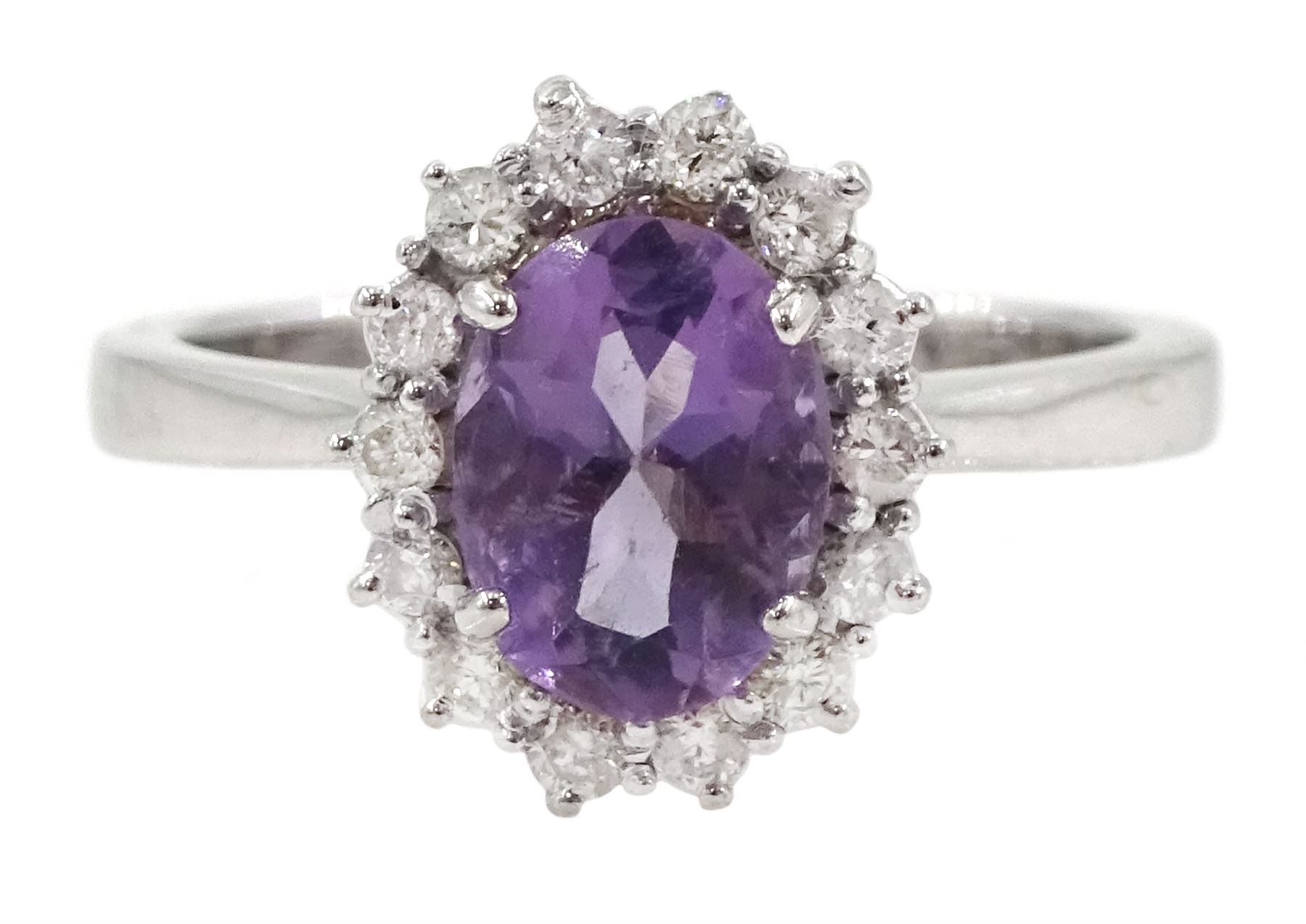 18ct white gold oval amethyst and round brilliant cut diamond cluster ring