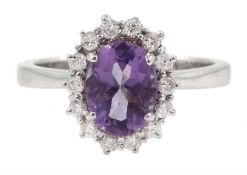 18ct white gold oval amethyst and round brilliant cut diamond cluster ring