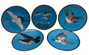 Near pair of Chinese Cloisonne plates decorated with jays in flight with geometric border on a brigh