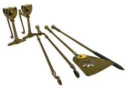 Set of three 19th century brass fire irons with spiral and knop finials and a pair of Art Nouveau de