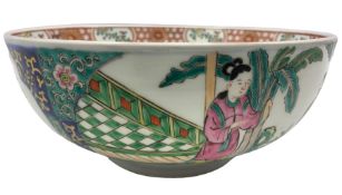 20th century Chinese polychrome decorated bowl with panels of figures in a garden