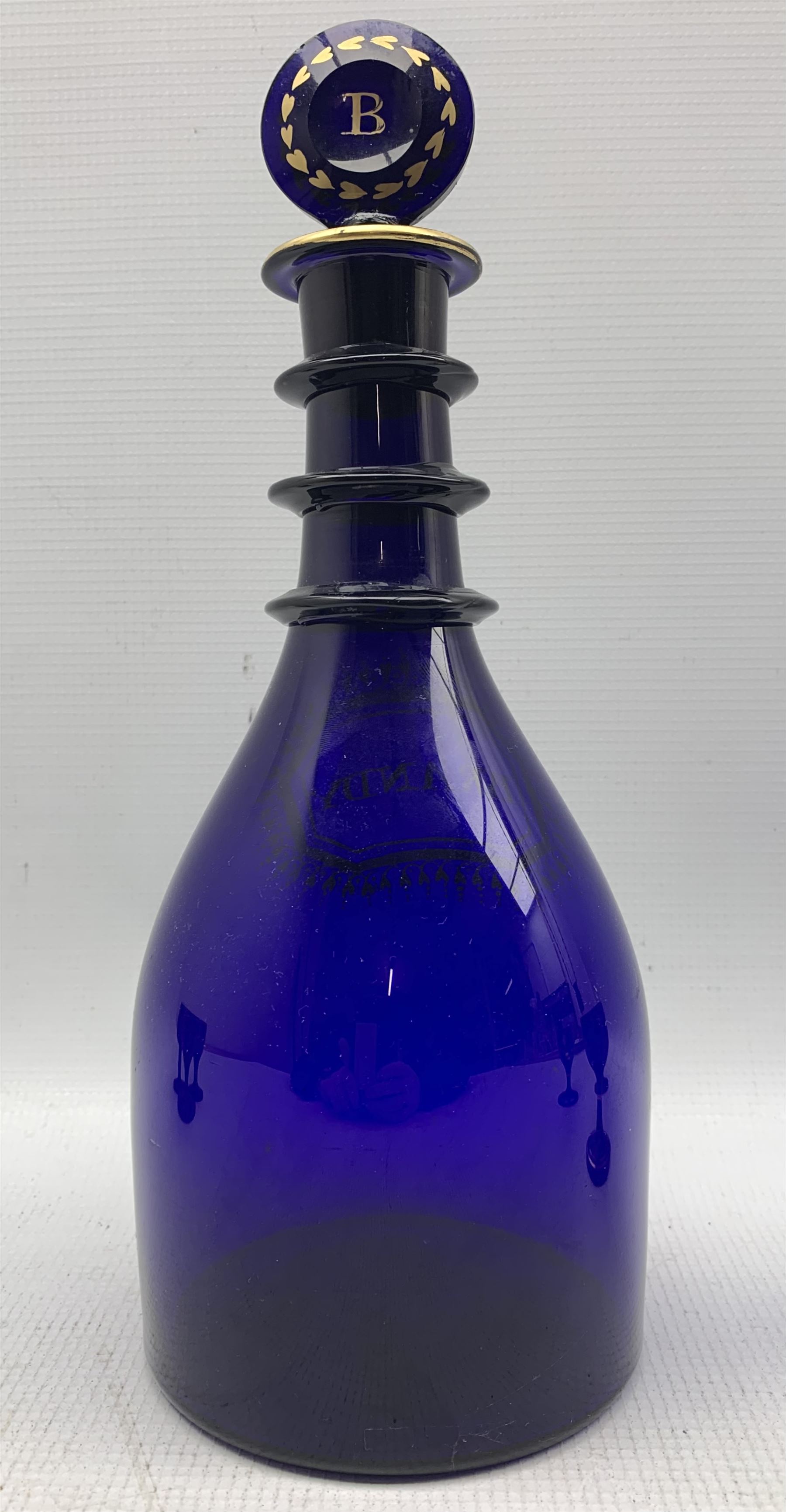 George III Bristol blue glass Brandy decanter with triple ring neck and gilt lettering and circular - Image 4 of 4