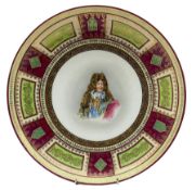 Vienna type porcelain shallow dish printed with a portrait panel of Louis XIV with a burgundy