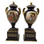 Pair of 'Vienna' porcelain urns and covers