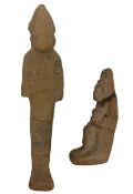 Carved stone Egyptian ushabti in the form of a standing figure H17cm and another seated holding a ch