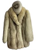 Lady's arctic fox fur coat with dark grey silk embroidered lining