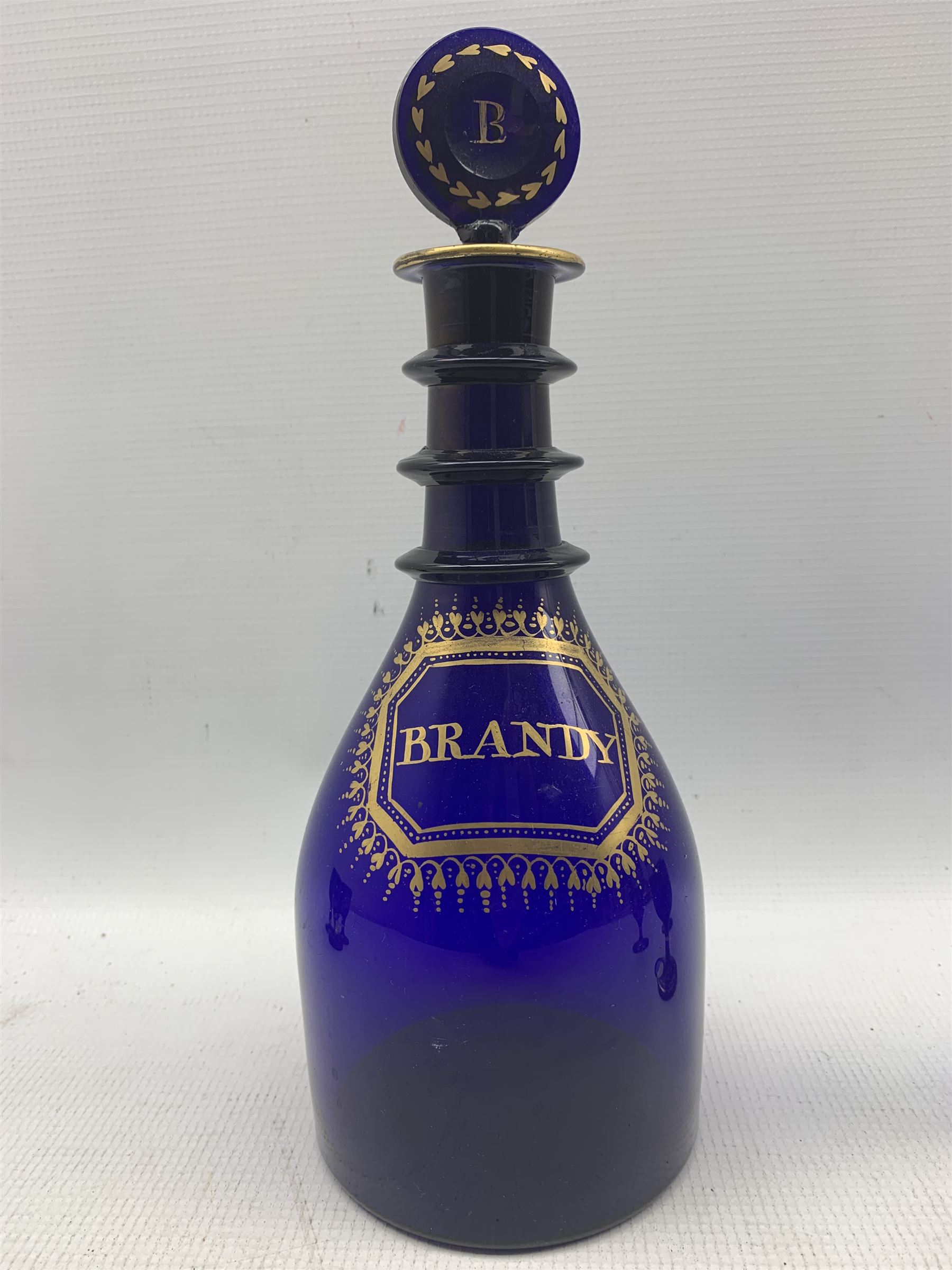 George III Bristol blue glass Brandy decanter with triple ring neck and gilt lettering and circular - Image 2 of 4