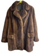 Mink half length fur coat with waist tie and paisley silk lining