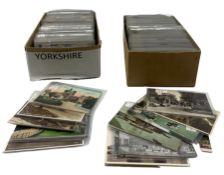 Box of loose vintage Yorkshire postcards and another of mainly London and Lancashire cards