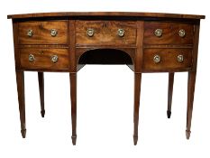 19th century mahogany bowfront sideboard fitted with central frieze drawer flanked by a deep cellare