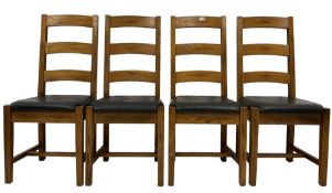 Set four of oak dining chairs with upholstered seat pads