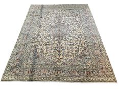 Large ivory Persian hand knotted rug